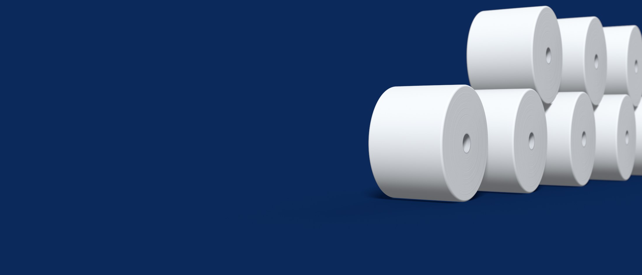 Large reels of white tissue paper